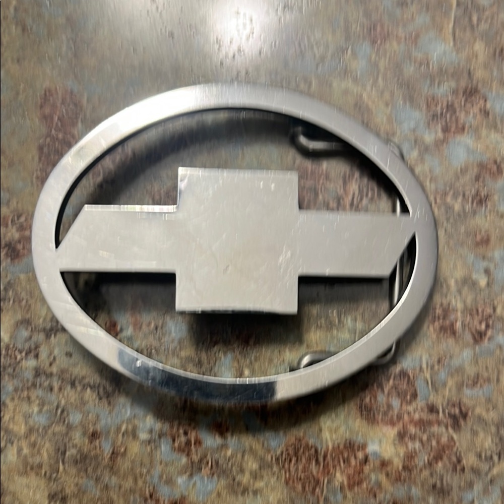 Polished stainless Chevy bowtie belt buckle. Been C and C machine cut.